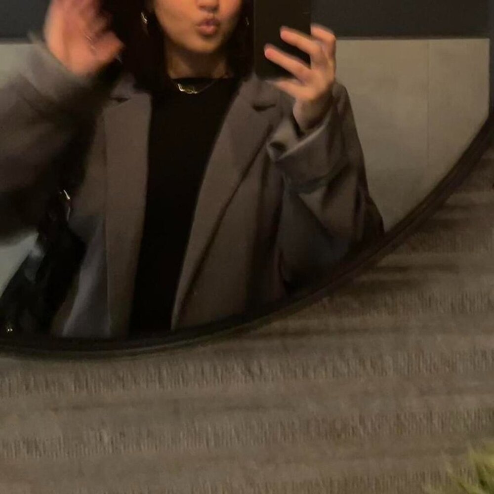 Grey Blazer - Oversized no buttons. Stays open. Has shoulder pads.